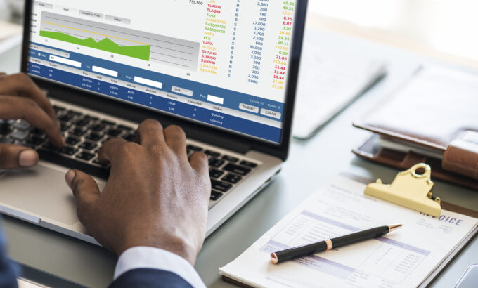 Black businessman using computer laptop
